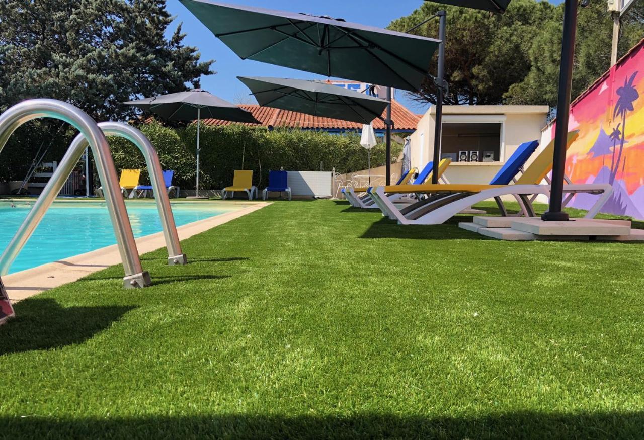 איגוס-מורטס Hotel Des 4 Vents "Esprit Camargue" מראה חיצוני תמונה