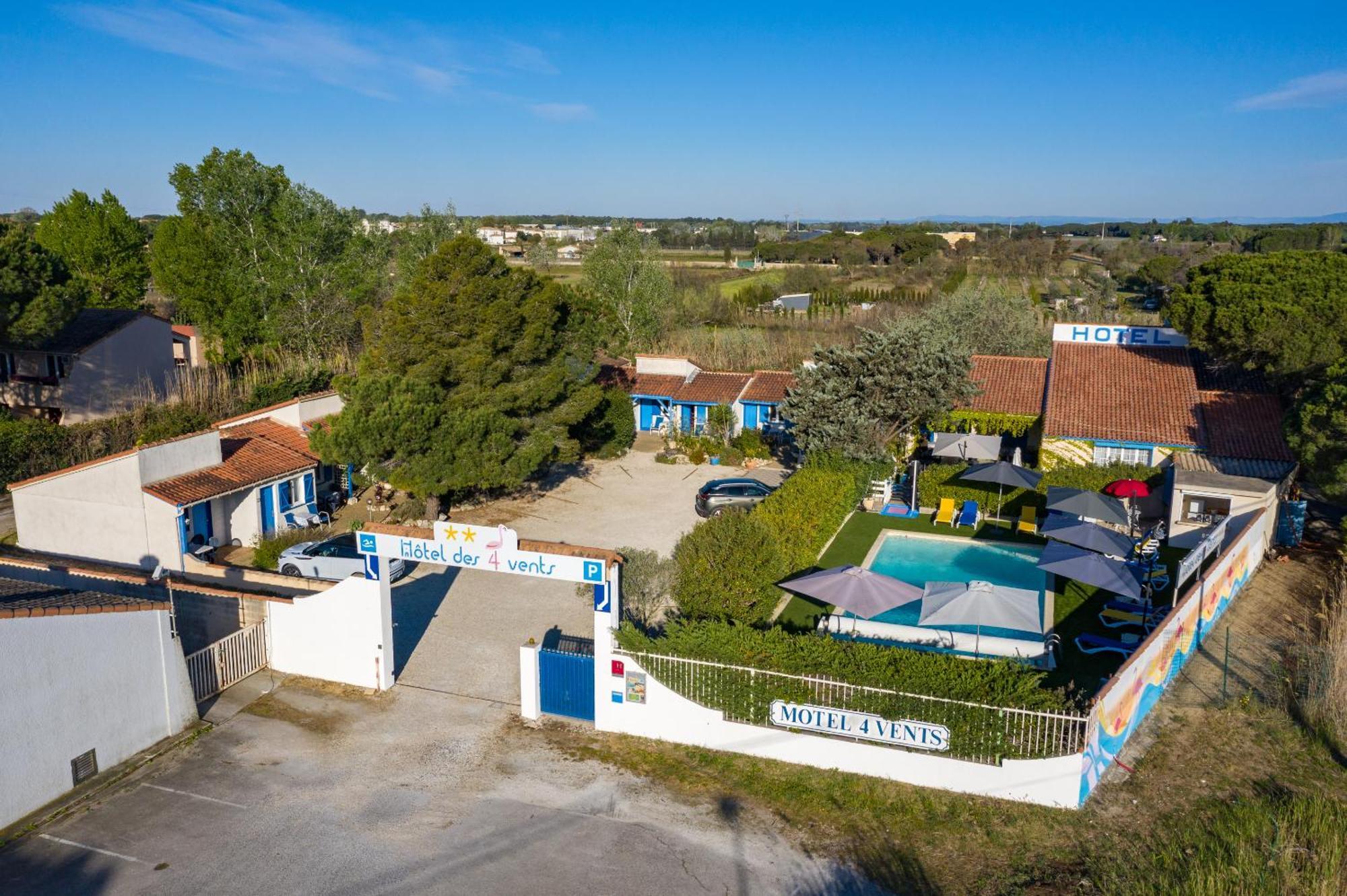 איגוס-מורטס Hotel Des 4 Vents "Esprit Camargue" מראה חיצוני תמונה